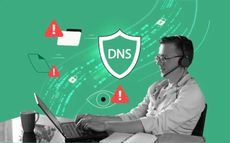 A remote worker at a laptop in a home office, with a glowing secure tunnel around the data flowing from the computer. Some data packets are shown leaking out with warning icons. A shield icon with “DNS” is overlaid to highlight privacy protection.